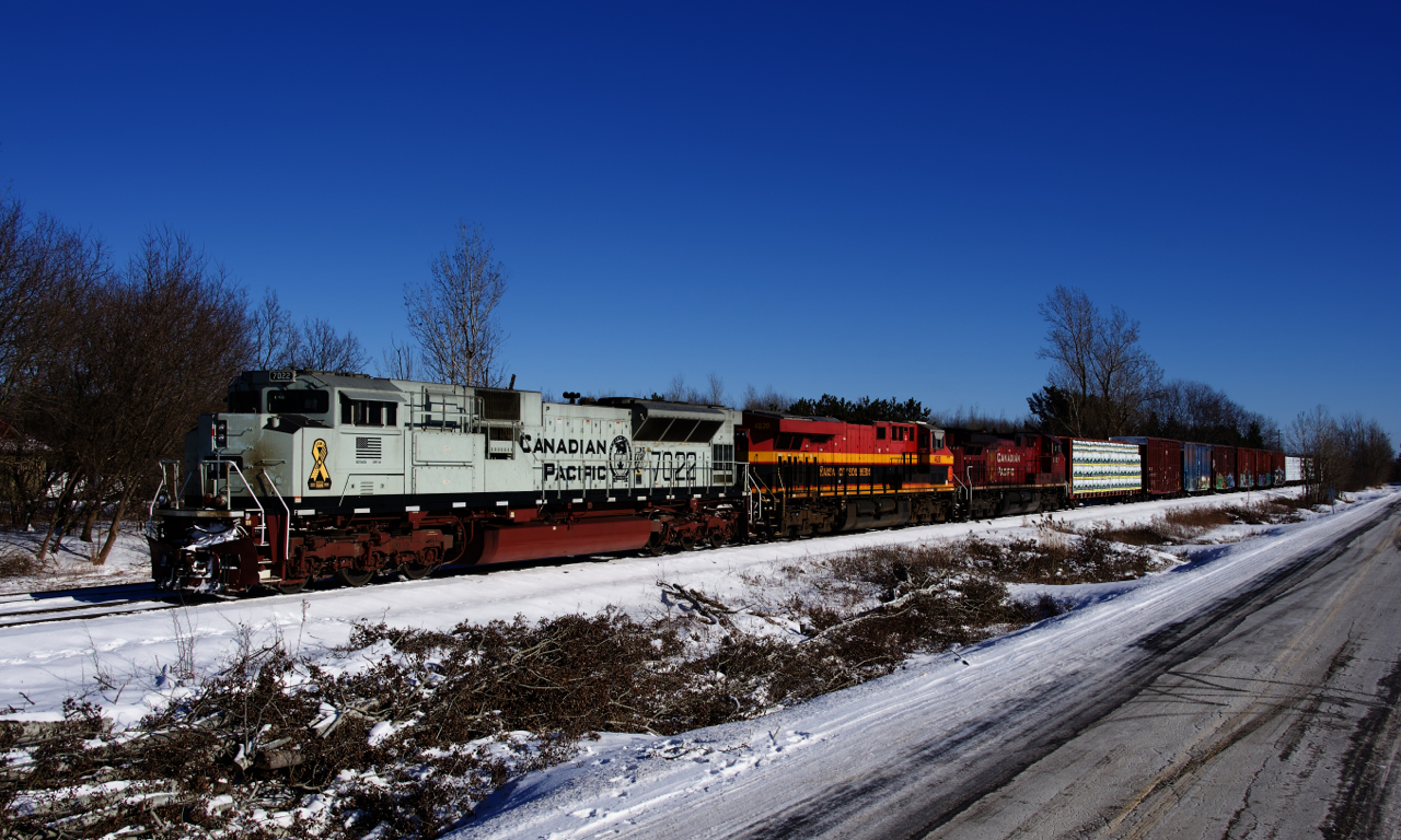 CP 251 has CP 7022, KCS 4820 and CP 8107 for power as it sits parked and crewless just west of Farnham. In a couple of hours a fresh crew will get on to bring it to Montreal.