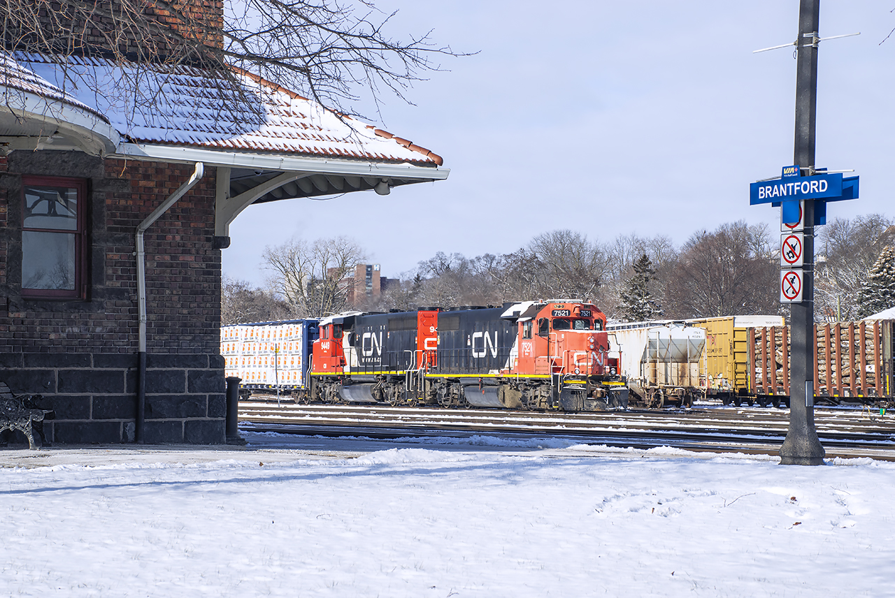 After setting off a cut of cars from Mabe, the crew of 580 takes lunch in the yard office while waiting for 382, 148, and 397 to pass.  Afterwards they will depart with 3 loaded centre beams for Rembos on the Hagersville Sub.