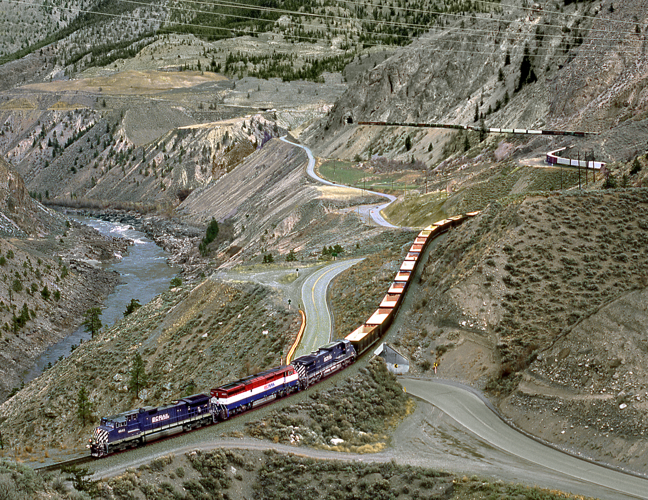 A mixed freight southbound descends into the Fraser Canyon via a 2% plus grade from Kelly Lake to Lillooet