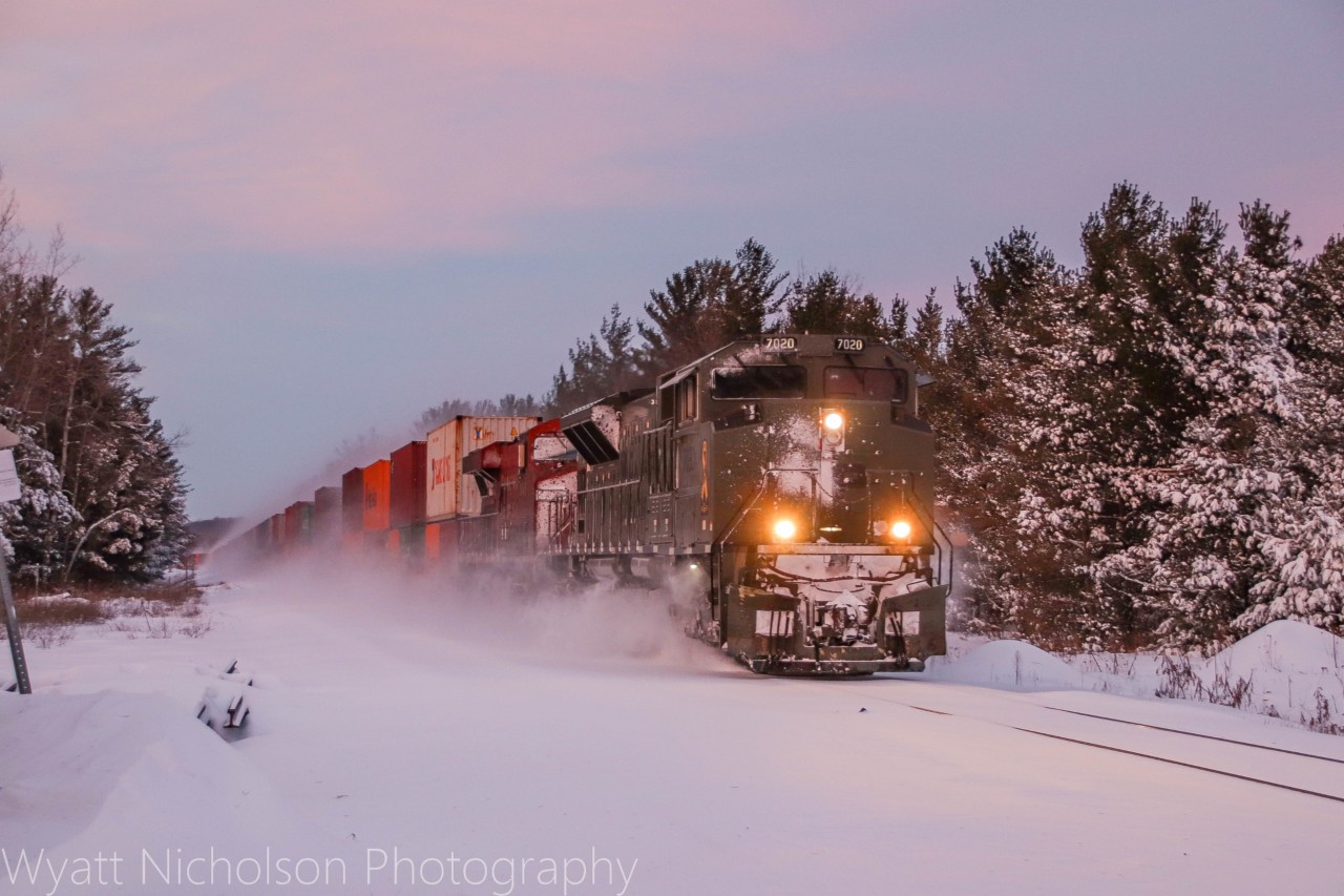 In what is usually a train to travel down the CP MacTier in the early hours of the morning, this time it ran late several hours giving railfans a slight opportunity to catch it with daylight. As the sun quickly faded railfans were aware CP 7020 was in the lead and some were brave to venture trackside for it. Luckily, I live close by so I also made my way out as the snowstorm paused for a while. This would be the first time it has lead on the CP MacTier to my knowledge.