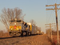 Here is a shot of very cool CP 235 today. When i heard that 235 had 7019 and the executive mac, I knew I had to go out for this train even if it was -10 degrees outside.. So me and my friend decided to first head out for it near Jeannettes Creek, but after waiting and having all my gear set up, i have heard some more information about 235 getting a hotwheel in Glencoe. Hearing this, we decided to head out more down the line as we weren't sure if the lighting was going to be as good (Shot near the Ringold Diamond). As the train approaching, my hands had gotten so cold so quickly that there was a couple of seconds where i couldn't take photos due to not being able to feel the button on my camera! Luckily, it didn't affect the photos and we were lucky enough to have the train come in some golden lighting. Enjoy!