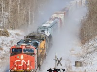 I really wasn't planning on a nice bitterly cold hike this morning, but a very slow 397 and time to kill changed that. I have always loved the view from the golf course bridge at mile 30 but it has been ages since I've done the shot. I was glad to see the sun appear even if it didn't warm up things. Hearing CN 397 had a UP trailing made it worth the effort this morning. 