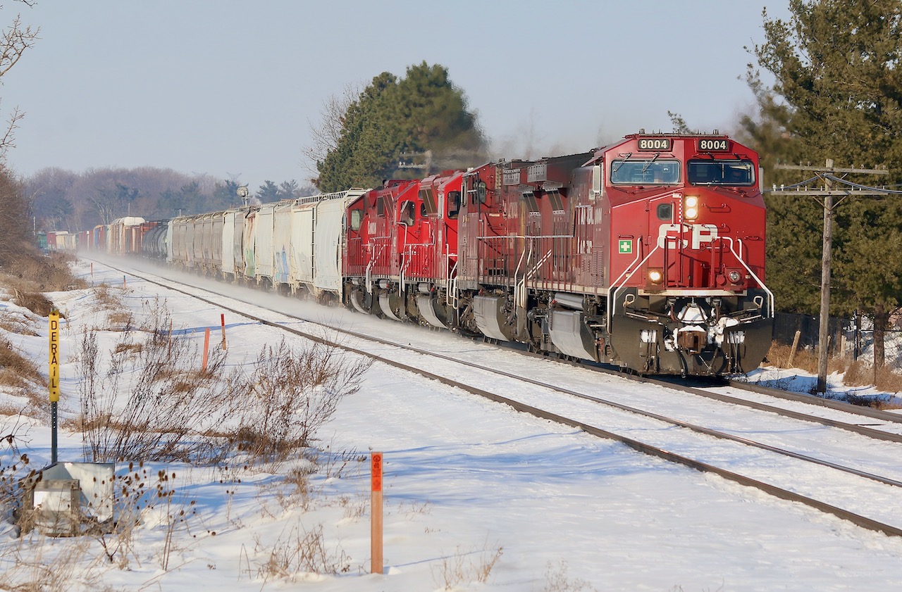Sometimes 234 is a little more interesting on a Monday, usually thanks to picking up stray units left over the weekend along its route. Today's train has a pair or "flares" on it in the form of rebuilt SD40ECO 5030 and GP38 former GP40X 4522. The large snow mounds here at Meadowvale come in handy these days.