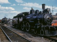 Former Canadian Pacific Railway steam locomotives 136 and 1057, now in excursion service lettered for the Credit Valley Railway, are seen outside the TH&B station at Hamilton.  Earlier in the day they had run an excursion from Toronto - Guelph Junction - Hamilton, and are taking on coal before their return trip.<br><br><i>Bryce Lee Photo, Jacob Patterson Collection Slide.</i>