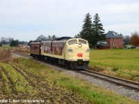The Jim Brown memorial train is seen approaching St. Thomas nearly done their westward journey from Salford with Jim's friends and family aboard. Leading the train is the "James A. Brown" - OSR 6508 which Jim had a hand in saving - not only obtaining the unit for the Waterloo-St. Jacobs which he managed, he also led OSR to buying it in 2013. To date this was the only time these F units have been brought out in recent months. <a href=http://www.railpictures.ca/?attachment_id=26484 target=_blank>Here's a pic of 6508 under CN from Roger Lalonde.</a> Glenn Courtney <a href=http://www.railpictures.ca/?attachment_id=21626 target=_blank> Got it as VIA 6305 in this amazing shot</a>.  And a pic of it in the CN inspired <a href=http://www.railpictures.ca/?attachment_id=34266 target=_blank>Green and Gold</a>