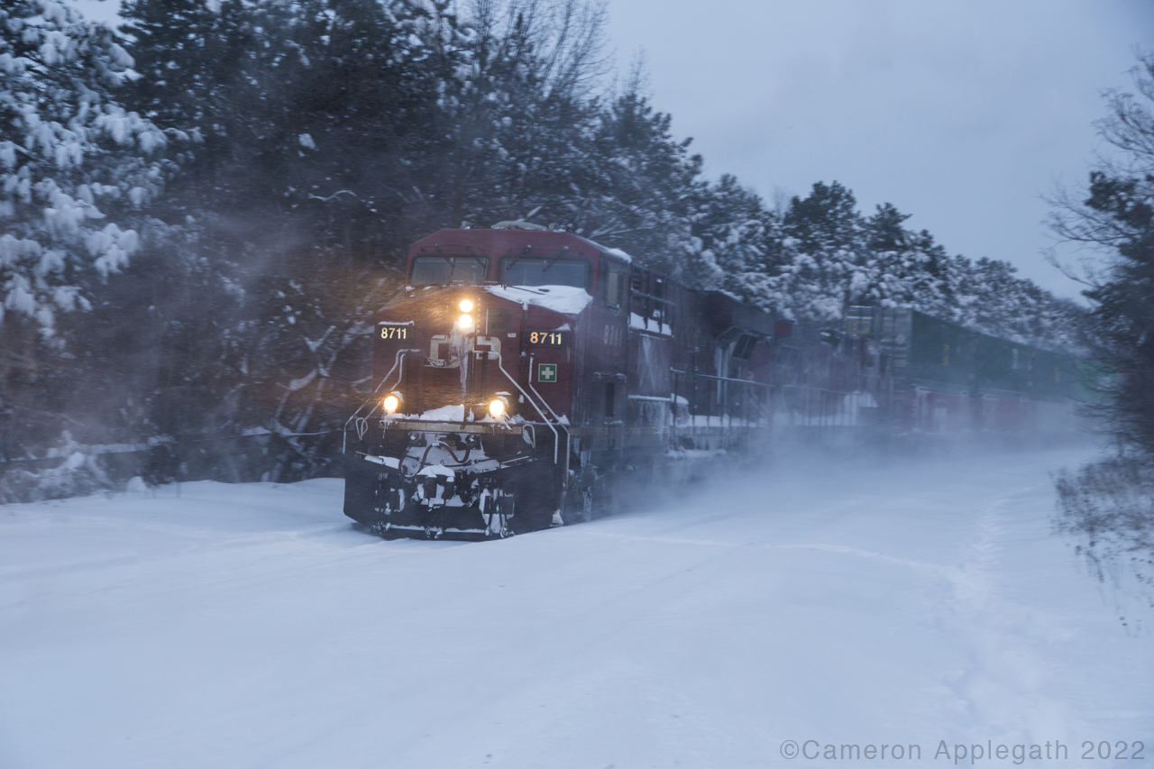 CP GEVO 8711 up front on intermodal no.119 to South Edmonton, sliding through Rosedale with a mile or more of domestic and marine cans on the pin. Peep the headlight beams illuminating the nether ahead of them.