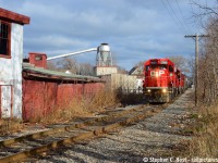 Passing the one time TH&B Customer Lawson Lumber, TH21 is making a beeline back to Kinnear to finish for the day and go off duty on a cool December day. I got lucky with the sun on this one..
