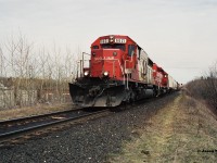 With a friendly wave from the conductor, a CP westbound is slowly passing the west siding switch at Killean, Ontario with work ahead in Galt. Here SOO Line SD40-2 6621 and SD40 6402 will left two hot cars at the Galt yard from Butler Metals in Cambridge before continuing their trip to London over the Galt Subdivision. 


