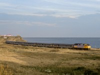 Westbound "Chaleur" hugs the shore of the Baie D'Chaleur on the Gaspes' south shore