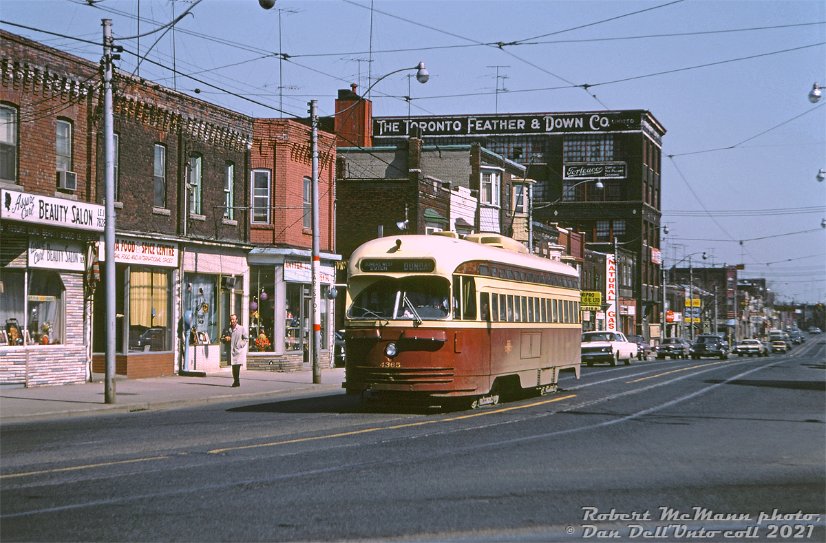 TTC PCC 4365 (A6-class, blt CC&F 1947-48) heads westbound on Dundas Street West on the Dundas route, about to go around the curve at Roncesvalles Avenue where Dundas turns northbound towards Bloor and Dundas West Subway Station. Interestingly enough, this stretch of Dundas today looks much the same as it did 50 years ago (not yet invaded with condo-ification), including The Toronto Feather & Downe Co. building which is now "Feather Factory Lofts".

Robert D. McMann photo, Dan Dell'Unto collection slide.