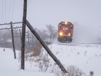 CP T78 with a SD60/GP38-2 pairing blasts through the isolated snow showers that occurred in Innerkip this day, and seemingly nowhere else for some reason!