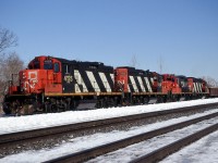 A quartet of CN GP9RMs pull down one of the yard leads while switching the west end of Aldershot Yard.  CN 4125 and CN 4138 (1st and 4th) are still on CN's roster; 4138 being the unit lettered "AR Illinois" for it's appearance in the 1997 movie "The Wrong Guy" that never got its CN noodle back.  CN 4143 was sold to Lampton Diesel Service, and then to Cando, now CCGX 4016.  CN 7076 was sold to Indiana Boxcar Company, as IBCX 7076. I think this is the only time I saw four GP9RMs together in a consist.  
