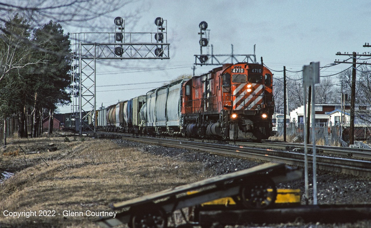 Something I wouldn't bother trying today is chasing a train from Guelph Junction to Streetsville, but back in 1992 it was possible and with an MLW M-636 on the point of this CP eastbound it was worth the effort.