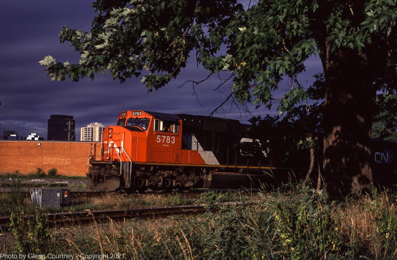 Sometimes you get lucky and this was one of those days! I got some sunshine on CN SD75I 5783 rolling through Hamilton before everything was swallowed up by black clouds.