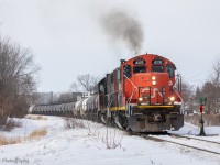 CN L538’s first assignment of the day on the Valleyfield is to drop off 50 empty Acid Tankers at the side track (Track V041), before they go down the CIL Spur where they’ll work National Silicates, and Goodyear. Here they are seen pulling past the switch, where soon the conductor will unhook the 50th Acid tanker, then she’ll line the switch to track V041, where 538 will back up into that track, then drop off the tanks, before they continue to the CIL Spur.