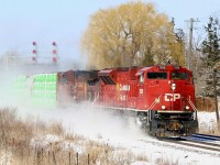 The decent cover of snow was still within the mainline thanks to a relatively quiet morning on CP other then a few GO trains and local T14. Hearing that train 234 had a SD70ACU leader was enough to get me trackside. I wasn’t trackside long before a headlight ahead of a snowstorm could be seen making track speed around the corner better yard. Soon all that could be seen is flying snow making a nice dramatic scene. I have to say CP’s red applied to the SD70 is a much nicer shade then that used on the older AC4400’s.