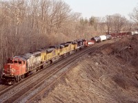 Once the GP40’s were mainly bumped from mainline duties it became a rule for me the catch as mainly trains with one leading. Not mainly because it was a GP40 but more because they almost always had something neat in the consist trailing. This day train 399 has a very ratty 9540 leading with new number boards, trailing was UP “flag” SD70ACE and SD70M along with a CN SD75. A decent EMD mix. The scenery at Bayview by this time was changing rapidly as the new third track was being built. Sadly this vantage point soon disappeared as greenery rapidly grew in and CN added a new signal bridge almost up to the road.