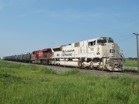 CP 7021 in army sand livery heads north on CP's Leduc Sub.