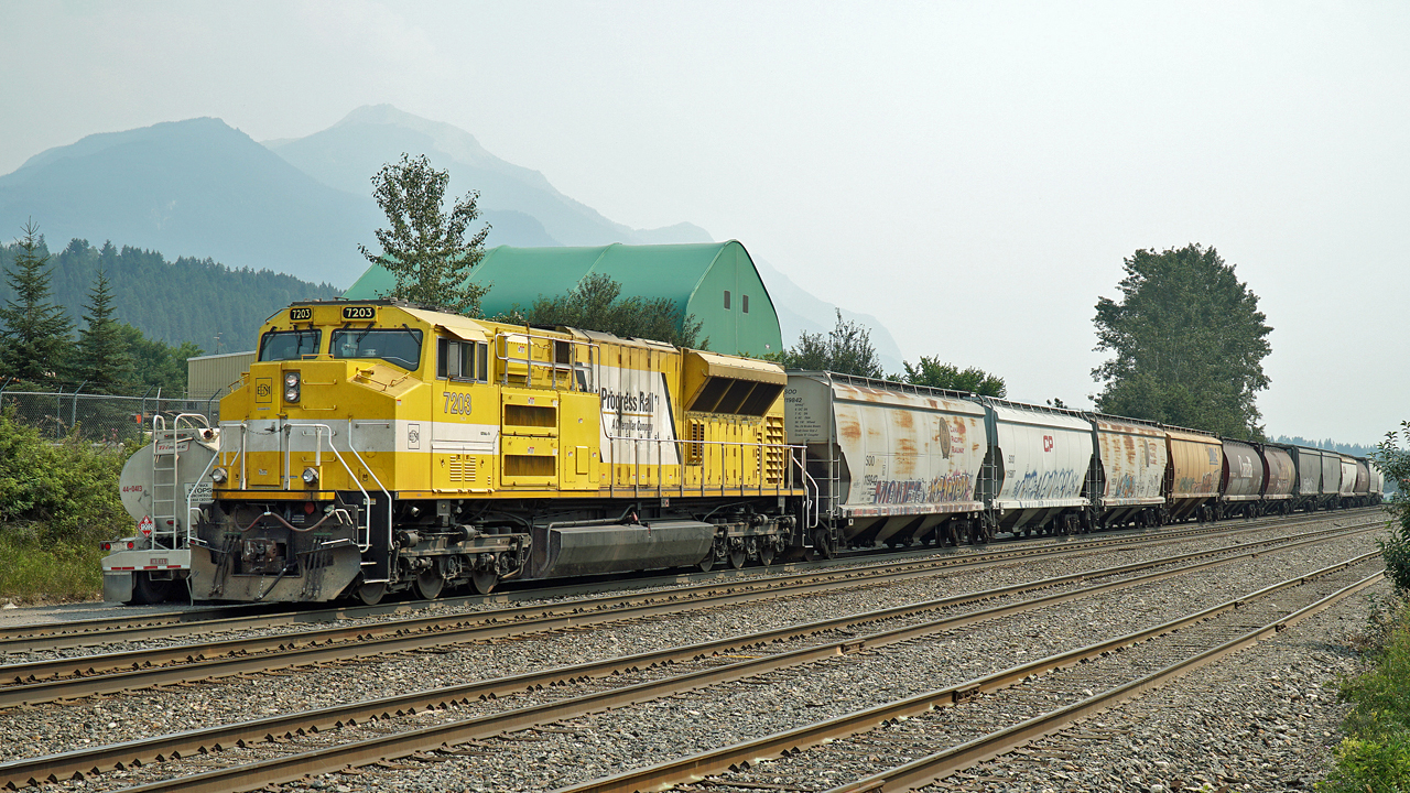 SD70ACe EMDX 7203 is the rear DP on an eastbound CP train paused in Golden for refueling.