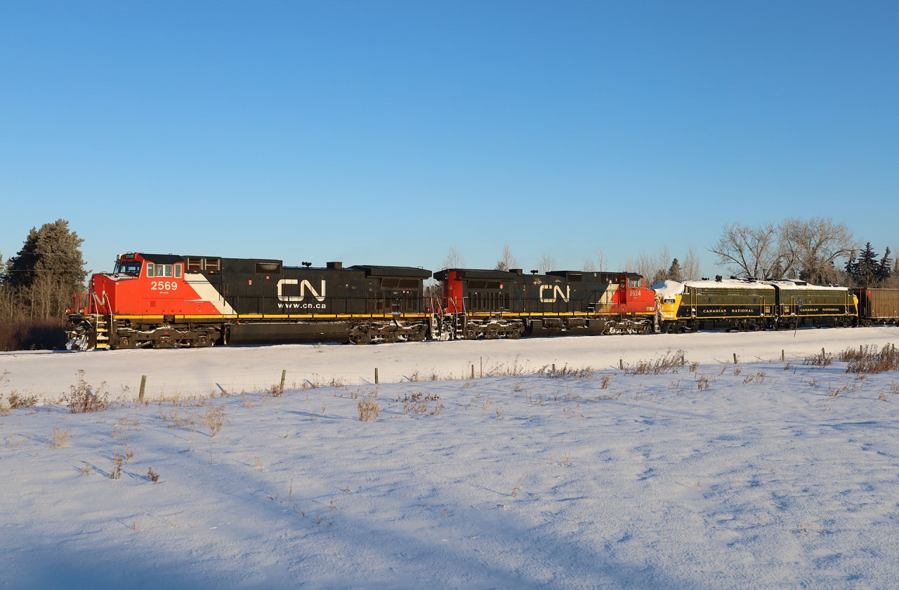 CN L 55651 17 has just left the Coronado Sub and entered the Vegreville Sub at St. Paul Junction with CN 2569, CN 2624, RPCX 6311 and RPCX 6304. These FP9Au's are privately owned and were on display at the Alberta Railway Museum in Edmonton, however they are now enroute to Assiniboia, Saskatchewan.  RPCX 6311 was previously VIA 6311, VIA 6529 and CN 6529. RPCX 6304 has a more storied history... Formerly VIA 6304, VIA 6509 and CN 6509 - it was also numbered 1967 and saw service on the Confederation Train in 1966 and 1967.