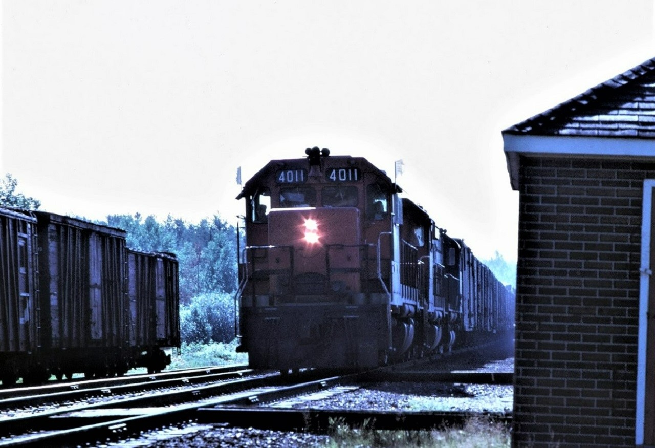 CN GP 4011 leads train 217 west through downtown Laforest, Ontario on August 20, 1972. Other units in the consist are 4003 and 3210.  This was the last time that I saw the 4011 before it was leased to the L&N Railway and subsequently wrecked and retired.