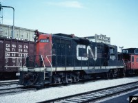 CN GP9 4575 and caboose 79614 are at Kitchener, Ontario in August 1981. GP9 4575 would eventually be rebuilt into GP9RM 7013 and was officially retired in 2000. 

