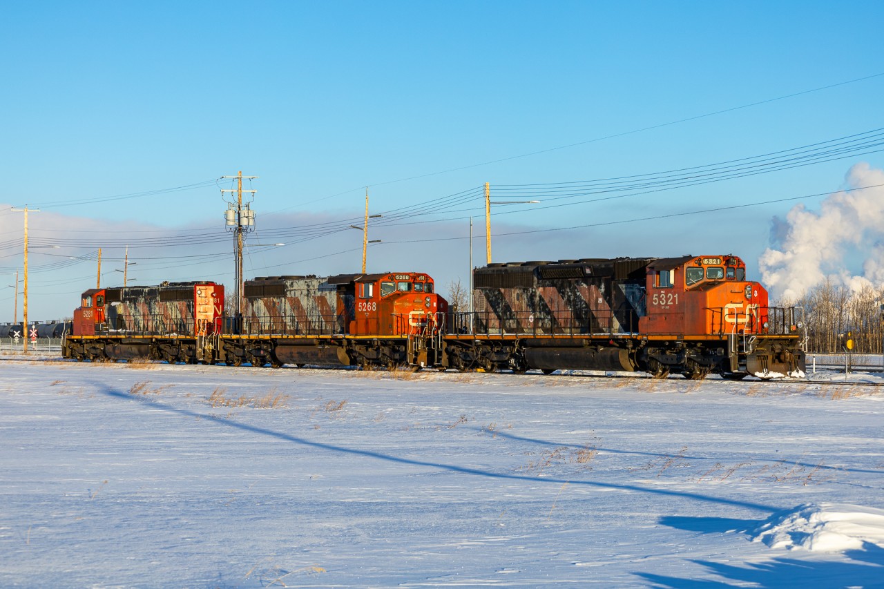 A trio of Zebra Stripe SD40-2Ws in 2022, is a rare site, however Scotford Yard in Fort Saskatchewan, Alberta makes this dream like scenario a reality on most days. Here we see CN 5321, CN 5268 and CN 5281 on L 51452 18 awaiting clearance into the Cando Yard at Pembina