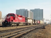 I liked the days of 'colour' on CP. The mid 90s featured so many leased units. Such a change from the same old red.  Pity the sun was harsh on the side as this train rolled west, but it couldn't be helped. Seen is CP 5736, CP 672 (x-KCS), HLCX 6570 and CP 5591. Haven't been back there in a long time. Wonder if the location is still accessible. 