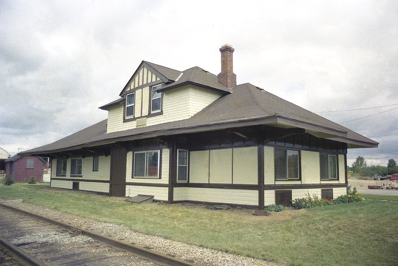 A view of the old Waterdown North CP station, located just off Parkside Drive. Back when I took this, the area was wide open. Today, it is a fenced compound and of course "no trespassing'.  At the time I shot this image I believe the company on location was called 'Barnes". Today it is Opta Minerals. The open road in to the facility along the tracks is now gone and replaced by a newer guarded laneway which appears to have an electronic entrance.  I believe the station, which still looks good, was an office back in the 70s and continues to serve that purpose to this day.