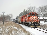 OSR GP9u's #1591 and #8235 lead the St. Thomas Job southbound towards the namesake city and through Mossley, Ontario in a beautiful December snowfall back in 2021.