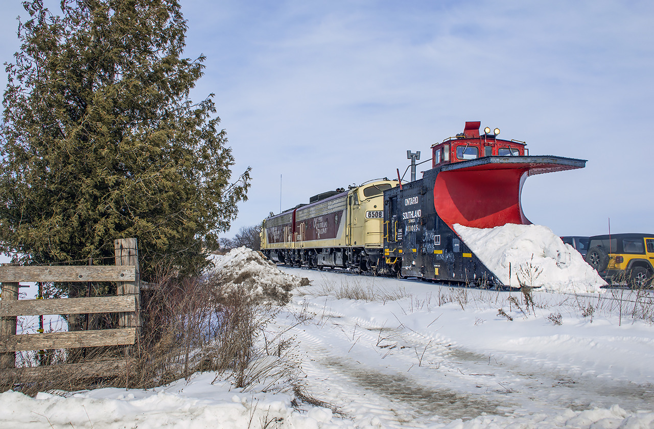 A surprise plow run by the OSR made the rounds from Woodstock to St. Thomas and Ingersoll to Tilsonburg today clearing flangeways for an upcoming inspection by a Sperry truck.  Here the extra, the first plow run with matching OSR painted FP9s, arrives back at Salford after plowing the St. Thomas Subdivision.  After a short stop at the shop they will depart for the end of the line at Tilsonburg on the old Port Burwell Subdivision, now the Tilsonburg Spur.