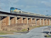 <br>
<br>
    Bridge series: 
<br>
<br>
     The expanse of the Ganaraska Viaduct is remarkable: 1,856 foot long ( 0.35 miles ).
<br>
<br>
     The original single tracked GTR viaduct was built 1851 – 1856 with 54 piers. 
<br>
<br>
    The GTR named the bridge the Prince Albert Viaduct, with the first train officially crossing October 13, 1856.
<br>
<br>
   GTR rebuilt and widened the PAV 1887 – 1983 with some 30 piers ( plus an arch) to allow double tracking. 
<br>
<br>
     VIA 64 passes on the viaduct at Port Hope, November 28, 2016 digital by S.Danko
<br>
<br>
     <a href="http://www.railpictures.ca/?attachment_id= 44680 ">  eastward view  </a>
<br>
<br>
    Noteworthy: Prince Albert of Saxe-Coburg and Gotha (1819 – 1861) was the consort of Queen Victoria (1819 – 1901), Queen of the United Kingdom of Great Britain and Ireland 1837 – 1901). [ consort is the spouse of a ruling monarch ]
<br>
<br>
   Fun Fact - The Notable & The Famous:  GTR  1854 – 1859  built Victoria Bridge (Pont Victoria), a k a Victoria Jubilee Bridge, is 1.9 miles long  with  24 ice breaking piers and rebuilt 1897–1898 with new spans for double track and later adding the 'new'  St. Lawrence Seaway Lift Bridge, also adding the Victoria Bridge diversion double track with a second SLS Lift Bridge: currently the CN St.Hyacinthe Sub miles 70.3 to 72.4 ( Montreal – Saint Lambert (south shore) –  Drummondville).
<br>
<br>
     <a href="http://www.railpictures.ca/?attachment_id= 46882 ">  CP's big one  </a>
<br>
<br>

   sdfourty