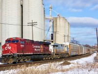 CP 147 with a neat combo of a rebuilt AC4400 and one of CN's recently acquired former Citi Rail Gevo's passes the Ardent mill in Streetsville. 