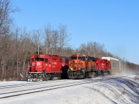 I had actually went to Guelph Junction to get a shot of CP 234 and CP 147 and found the power of T69 sitting idling away in the siding. After CP 234 departed, CP 147 led by BNSF 6558 and CP 7042 flew by at full track speed which made for a very nice side by side with the CP 3053. T69 would sit there all weekend and eventually the second unit froze up and  CP 3053 would be very low on fuel but they still managed to make it westward on Monday.