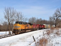 This Union Pacific 8871 engine had quite the time the last few days. It ran light power eastward yesterday to rescue CP 255 at Guelph Junction and led back west later that day to quite the crowd of railfans. It then ran back east and south down the Hamilton sub for a pick up over night. Today was its return trip as 2T69 where it led the original power for CP 254/255 in CP 8704 and CP 8077 back west with 6800 feet of auto racks.