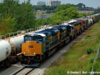 I've grown to like this angle, for two reasons: this shows Kitchener before the development explosion and of course, these CSX units which were being tested on GEXR 432/1 that summer are off the CSX roster - and <a href=http://www.railpictures.ca/?attachment_id=26340 target=_blank>what a summer it was</a>. I do believe some of these are up north in Labrador and Quebec on the iron ore roads now as leasers. Either way, with the mainline blocked with cars this was the only angle available to me, and one of the few times I pulled anything half decent here. It's grown in even more and much harder to do.. after all it's been nearly 18 years..





