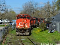 CN 540 is rounding the wye in Guelph with four units in this garden railway scene that <a href=http://www.railpictures.ca/?attachment_id=19133 target=_blank>I've shot before</a> even <a href=http://www.railpictures.ca/?attachment_id=19156 target=_blank>Even in winter</a>. More to come :) I love the winter but right now.. I want the spring.

