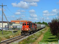 CN L540 is shoving northward passing what the crews call "CN Muscle Beach". With hot cars for Traxxside, all hands are on deck to make sure they are delivered ASAP. The Southern Ontario superintendent Larry Karn was on hand to make sure these cars arrived for Traxxside to be delivered to a large Brewery that was at risk of being shut down. Is CN 4028 still on the roster or active anywhere? This would be the oldest rebuild gp9 on the roster based on date of rebuild - it's the last of it's class.
