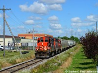 CN L540 is shoving northward passing what the crews call "CN Muscle Beach". With hot cars for Traxxside, all hands are on deck to make sure they are delivered ASAP. The Southern Ontario superintendent Larry Karn was on hand to make sure these cars arrived for Traxxside to be delivered to a large Brewery that was at risk of being shut down. Is CN 4028 still on the roster or active anywhere? This would be the oldest rebuild gp9 on the roster based on date of rebuild - it's the last of it's class.
