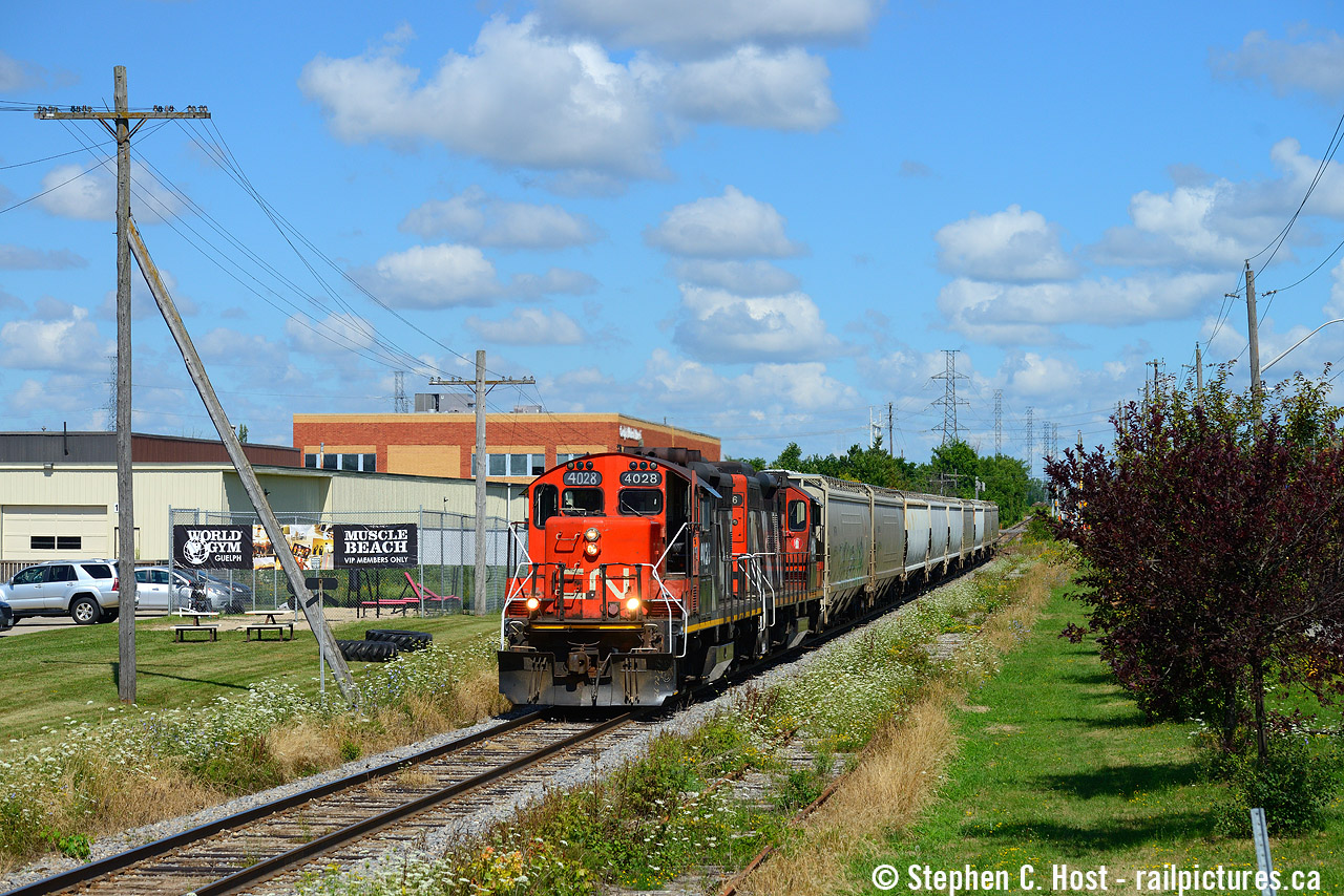CN L540 is shoving northward passed what the crews call "CN Muscle Beach". With hot cars for Traxxside, all hands are on deck to make sure they are delivered ASAP. The Toronto uperintendent of operations was on hand to make sure these cars arrived for Traxxside to be delivered to a large Brewery that was at risk of being shut down. Is CN 4028 stll on the roster or active anywhere? This would be the oldest rebuild gp9 on the roster based on date of rebuild - it's the last of it's class.