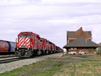 Coal Empties bound for the Bienfait coal fields near Estevan pass the unused former Division HQ station. Prior to dieselization Souris was a busy terminal with grain from Southern Saskatchewan arriving from Weyburn and Arcola and coal from the various mines around Estevan.