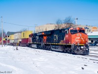 I was expecting  Toronto-Halifax intermodal Z120 to show up at around 11;30 AT,
but trains being trains they just get later. My driver (wife) was not thrilled!
At least it was sunny with fresh snow on the ground,  albeit on the chilly side (-11 C, with thankfully no wind.)

Feb 26th 2022 @ 12:05, Z120 by Amherst station with 370 axles, CN 3081, CN 3260 + DPU CN 3853.