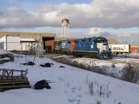 One of CN's... interesting acquisitions paired with a GTW lift some boxcars from XLT Transport at Etobicoke North. The patch work is pitifully hilarious on the lead unit, one may wonder when it will get a fresh coat of CN website red.