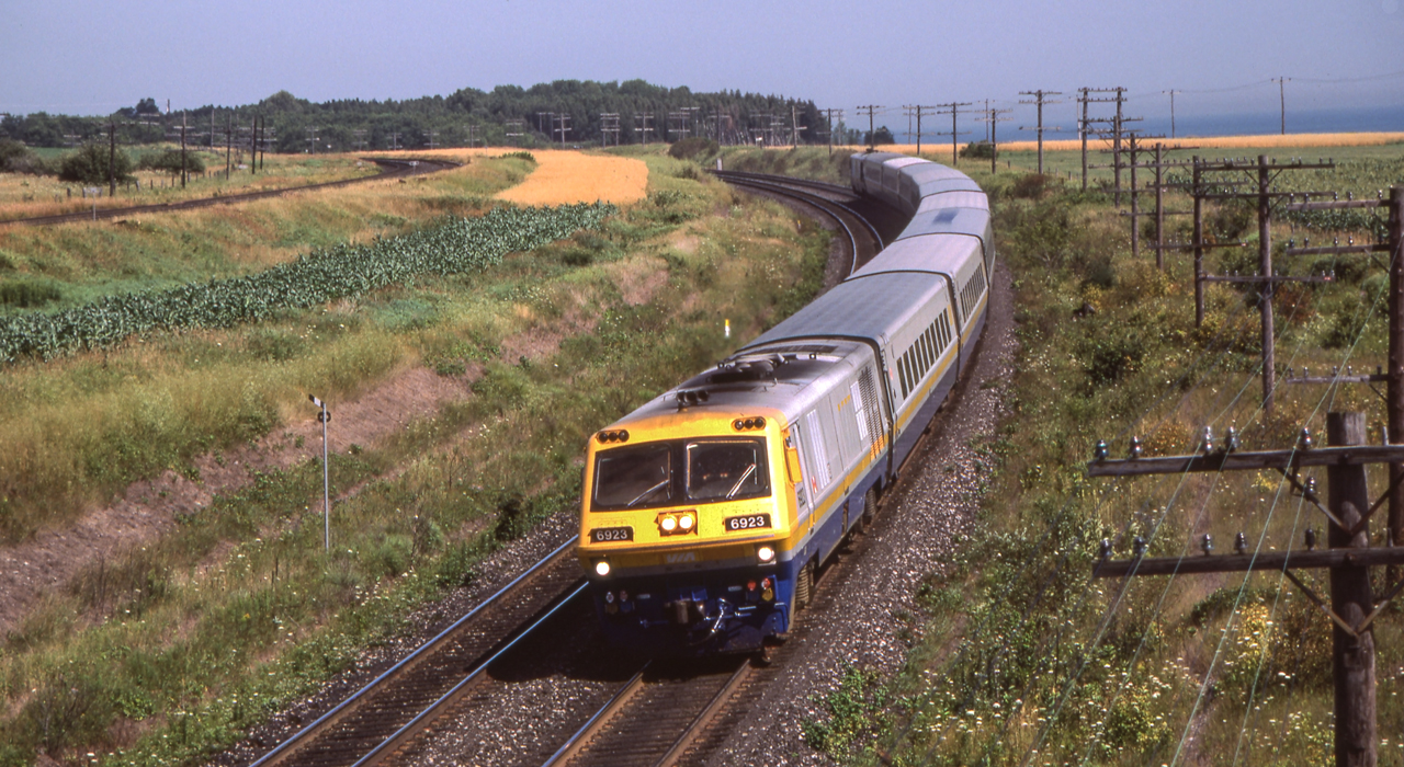 VIA 6923 is in Newcastle, Ontario on August 8, 1985.