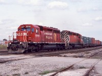 Identity crisis. At some point if I remember the story correctly St. L&H 5648 received the long hood off another unit, possibly a wreck repair. Not long after this photo was taken the StL&H lettering on the nose was painted out and replaced by a crude looking “CP”. Here the 5648 is seen leading train 159 into Guelph junction on an overcast day.