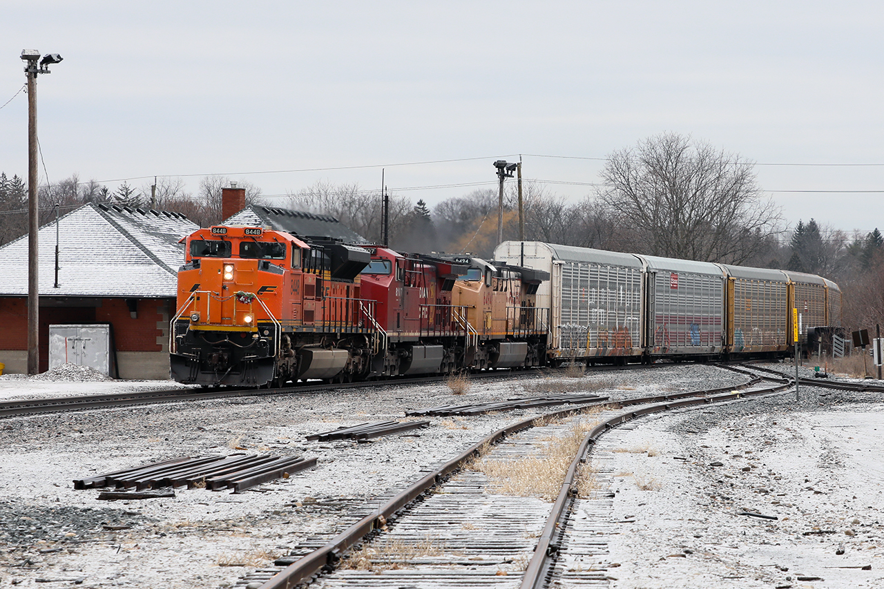 Oranges, apples and bananas pass the iconic Galt train station. The morning's freezing rain clings to the railings of the lead unit...as does a bouquet...perhaps related to the missing decals. CP's recent train renumbering (the purpose of which still evades me except to confuse every single RTC and crew member with no other obvious accomplishment) means this is former 244 with has dropped most of its autoracks at Wolverton. Where this collection of power goes from Toronto will likely get a lot of scrutiny.
