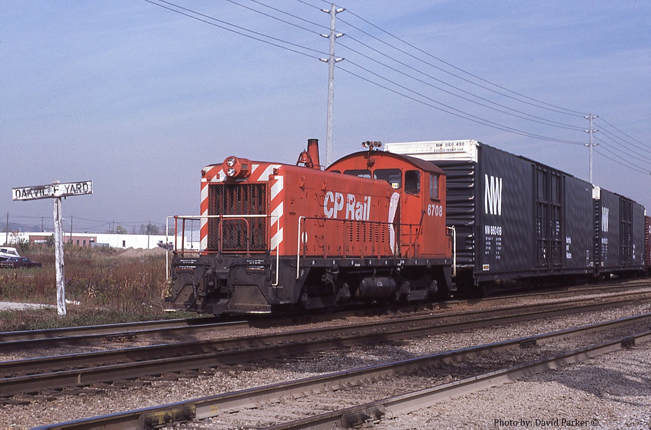 CP 6708 (SW8) switches out some hi-cubes for Ford Motor Co at the West end of Oakville Yard. At this date the CN and CP both had yard jobs switching Ford's Oakville assembly plant. However, a CP engine did not mean it was a CP crew. Crews were just assigned whatever power was available first. CP crews did prefer using the CN power as the cabs were much nicer.