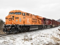 At one time known as CMQ #1, then CPR #251 and now CPR #223, the through freight from Brownville Jct, Maine approaches Adamsville, Quebec.