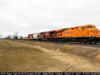 Heading back east, CP's 8781 in Hapag-Lloyd paint, leads train #130 (formerly #140) at MP 91.3 of CP's Windsor Subdivision on a dreary March 31, 2022.  Hopefully today 8781 will be able to make good time from Windsor to London unlike back on March 24th when it had to rescue a dead Train #244 that had run out of fuel.  Sun has eluded me the 3 times this unit has gone by, but I still haven't lost faith....  :-)
