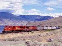 One of my favourite images from my second road trip out west almost 20 years ago now. We had CP’s SD90’s high on our list but of course GE’s dominated, especially in BC, nevertheless CP train 101 graced us with a SD90 leader so we followed it from Kamloops. As we drove through Savona  there was a nice sweeping “S” along Lake Kamloops so we set up at the end and waited a few minutes. It was unfortunate we could not get a bit of a higher elevation but I’m not complaining, we had a nice backdrop. 